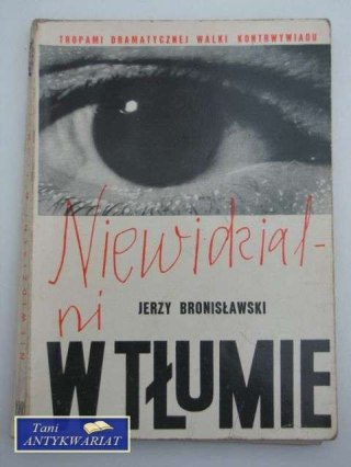 NIEWIDZIALNI W TŁUMIE