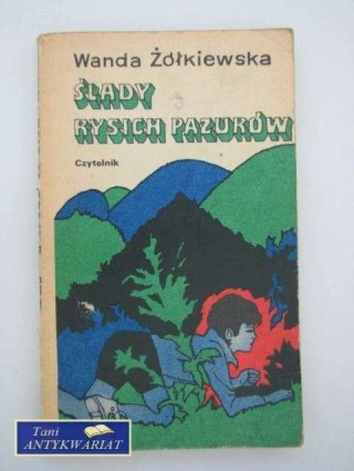 ŚLADY RYSICH PAZURÓW